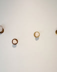 Set de 8 Percheros Mármol + Bronce